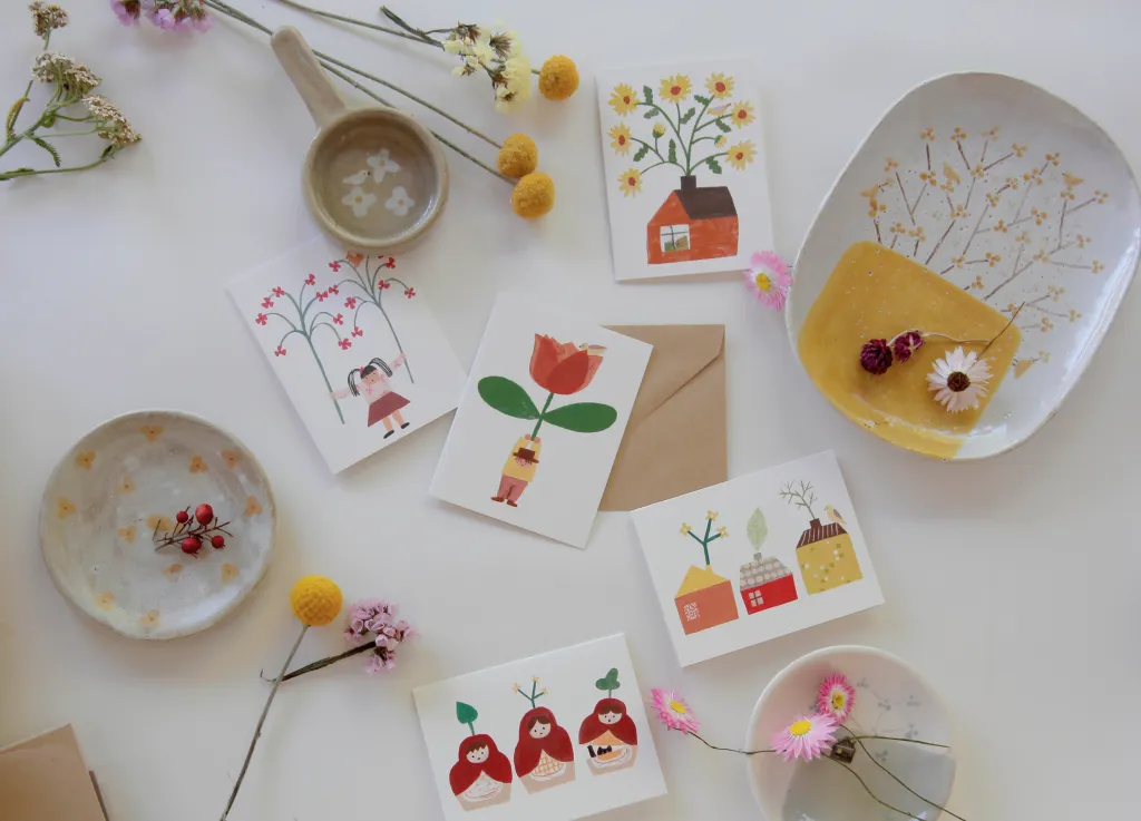 Colourful designs on paper and plates.